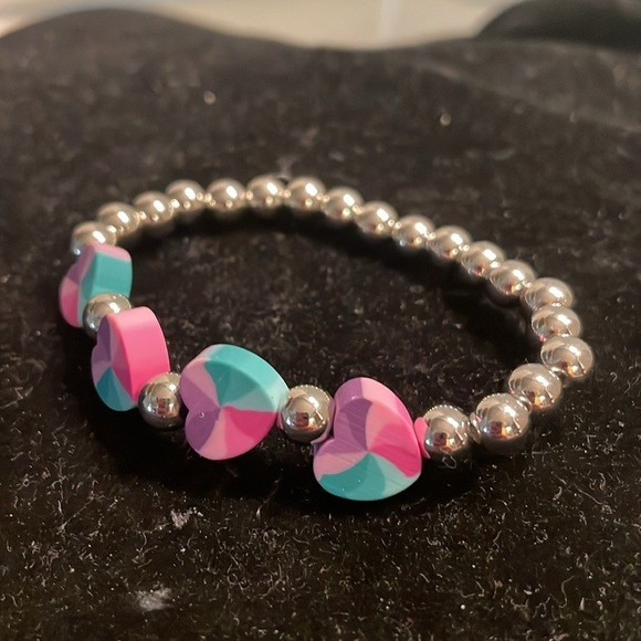 7” beaded stackable stretch bracelet with 23 silver beads & 4 heart shaped beads - Picture 3 of 13